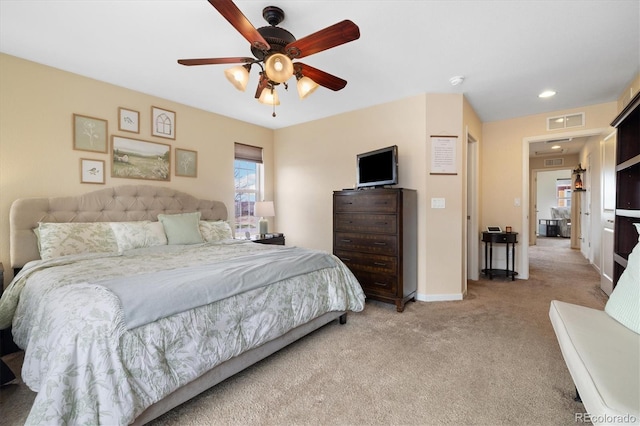 12744 Leyden St Unit F, Thornton, CO 80602 - bedroom with light carpet and ceiling fan
