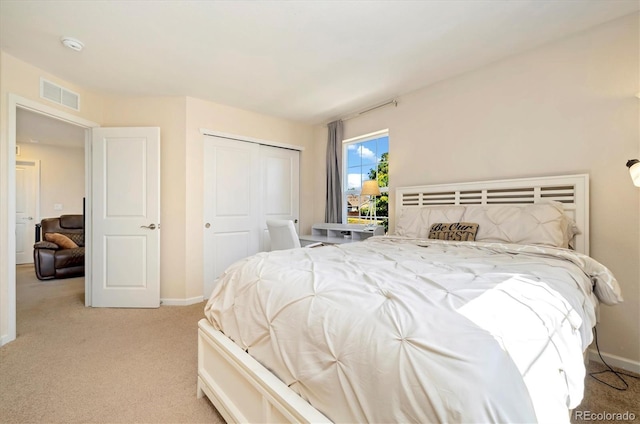 12744 Leyden St Unit F, Thornton, CO 80602 - bedroom with light colored carpet and a closet