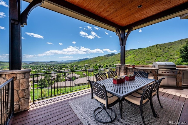 6194 Falcon Ridge Way, Morrison, CO 80465 - wooden deck with a mountain view