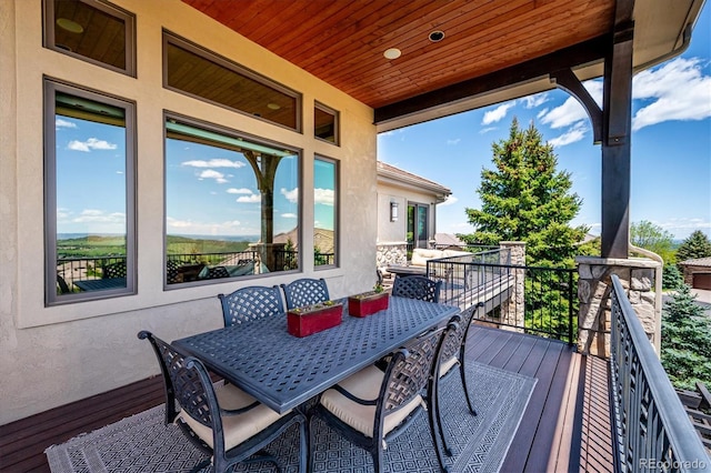 6194 Falcon Ridge Way, Morrison, CO 80465 - wooden deck featuring outdoor dining space