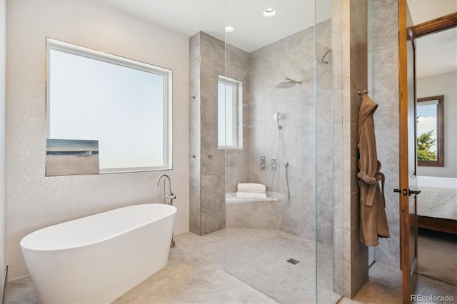6194 Falcon Ridge Way, Morrison, CO 80465 - ensuite bathroom with a freestanding tub and a walk in shower