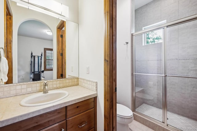 6194 Falcon Ridge Way, Morrison, CO 80465 - full bathroom with toilet, vanity, and a shower stall