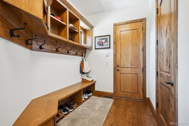 6194 Falcon Ridge Way, Morrison, CO 80465 - mudroom featuring dark wood-type flooring and baseboards