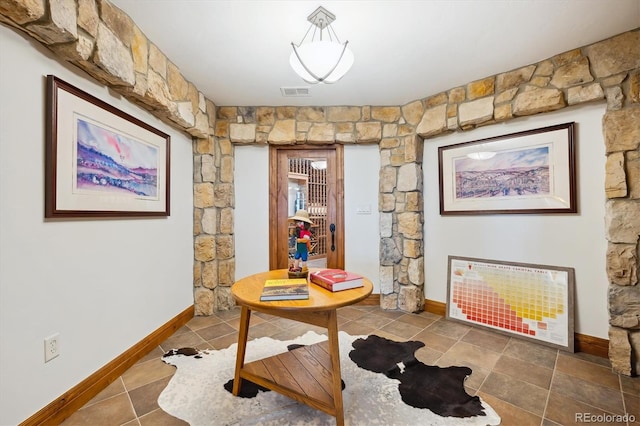 6194 Falcon Ridge Way, Morrison, CO 80465 - tiled home office with baseboards