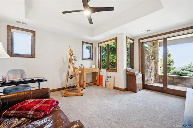 6194 Falcon Ridge Way, Morrison, CO 80465 - living area with a raised ceiling, baseboards, carpet, and ceiling fan