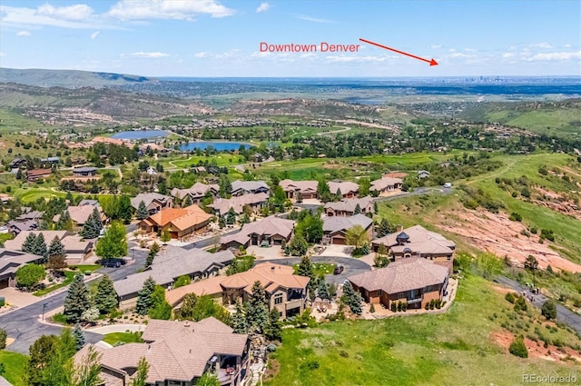 6194 Falcon Ridge Way, Morrison, CO 80465 - aerial view of residential area featuring a nearby body of water