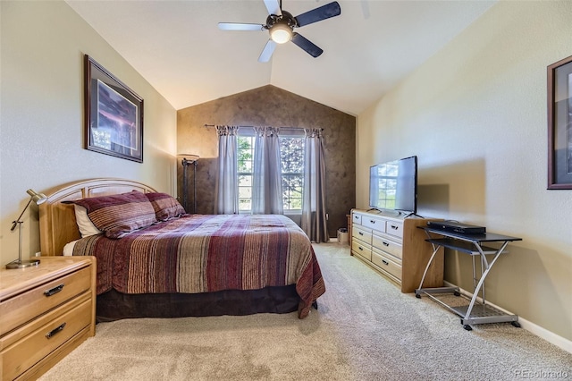 bedroom with ceiling fan, light colored carpet, and lofted ceiling