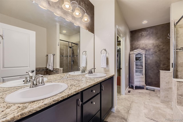 bathroom with vanity and walk in shower