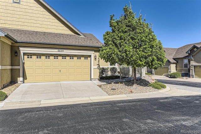 view of front of home featuring a garage