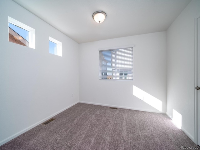 13588 E 103rd Pl, Commerce City, CO 80022 - carpeted empty room featuring visible vents and baseboards