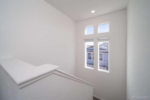 13588 E 103rd Pl, Commerce City, CO 80022 - stairway featuring recessed lighting