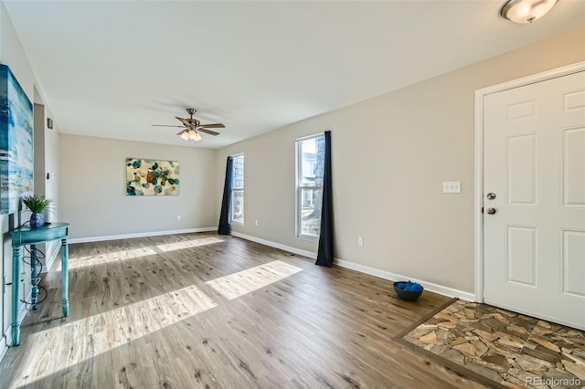 interior space featuring ceiling fan and hardwood / wood-style floors