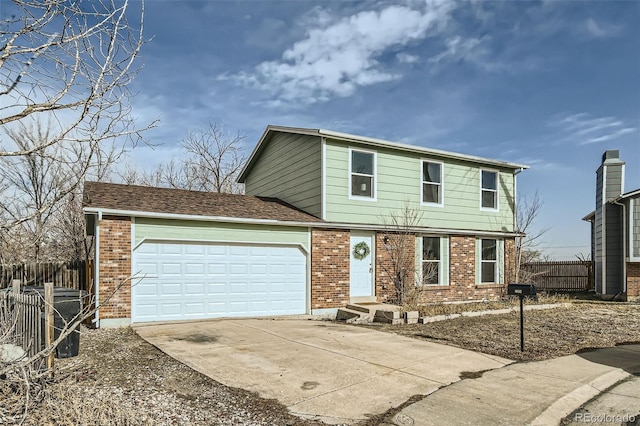 front of property with a garage