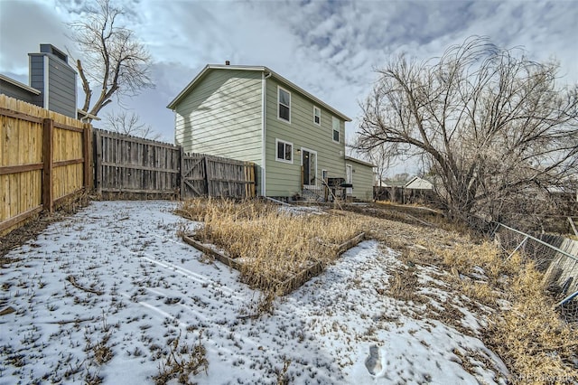 view of snow covered property