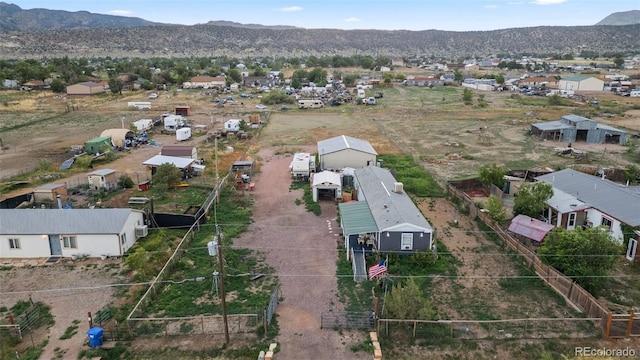 drone / aerial view featuring a mountain view