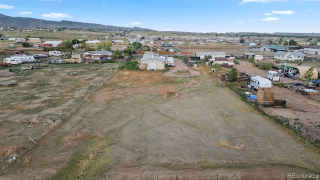 drone / aerial view featuring a mountain view