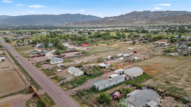 drone / aerial view featuring a mountain view