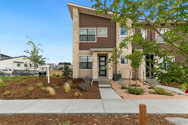 view of front of property featuring central AC unit