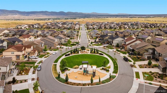 drone / aerial view featuring a mountain view and a residential view