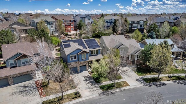 drone / aerial view with a residential view