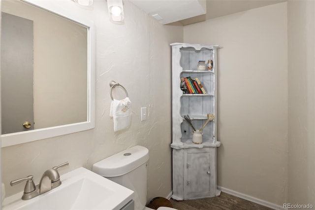 9123 Gray Ln, Conifer, CO 80433 - bathroom featuring a sink and wood finished floors