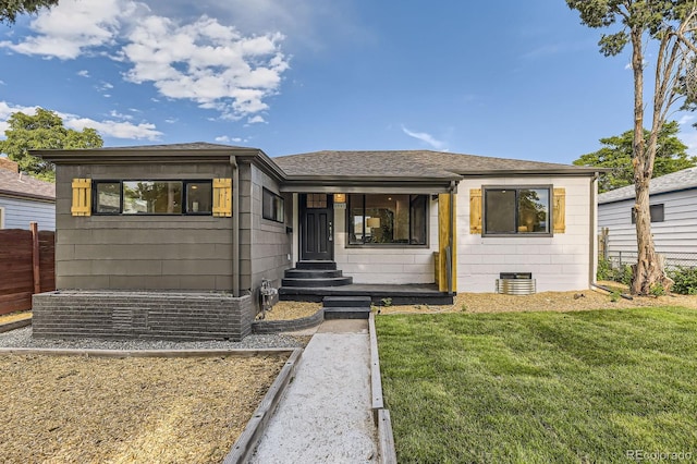 1640 Iola St, Aurora, CO 80010 - view of front of house featuring roof with shingles