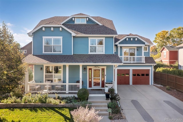 view of front of property with an attached garage, covered porch, a shingled roof, fence, and driveway