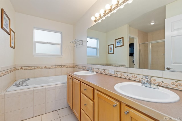 bathroom with a sink, a shower stall, a bath, and tile patterned floors