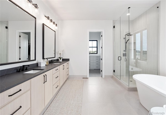 bathroom with separate shower and tub, dual bowl vanity, and tile patterned flooring