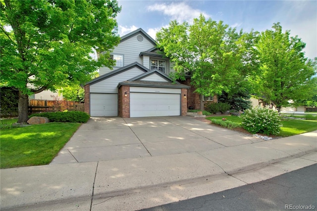 10356 Lions Heart, Lone Tree, CO 80124 - view of front facade with brick siding and driveway