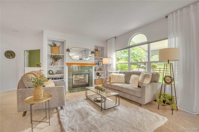 10356 Lions Heart, Lone Tree, CO 80124 - living area with carpet floors, built in features, and a fireplace