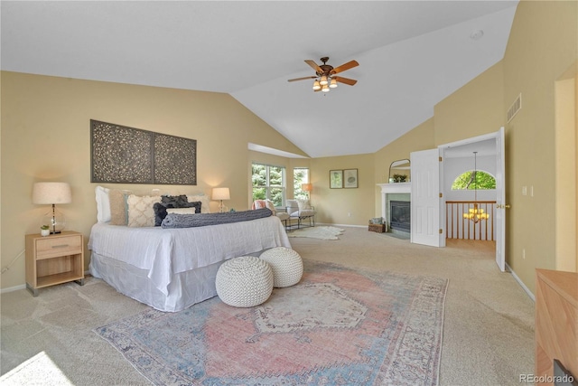 10356 Lions Heart, Lone Tree, CO 80124 - carpeted bedroom with a glass covered fireplace, a ceiling fan, and high vaulted ceiling