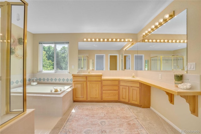 10356 Lions Heart, Lone Tree, CO 80124 - full bath with a garden tub, double vanity, and a shower with door