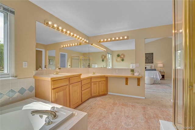 10356 Lions Heart, Lone Tree, CO 80124 - full bathroom featuring ensuite bath, double vanity, and a bath