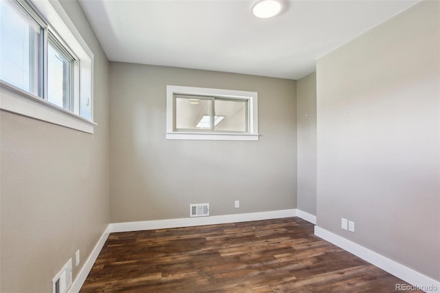 10505 Clarkson St, Northglenn, CO 80233 - empty room with dark wood-type flooring and baseboards
