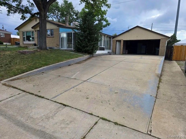 10505 Clarkson St, Northglenn, CO 80233 - ranch-style house with brick siding and a garage