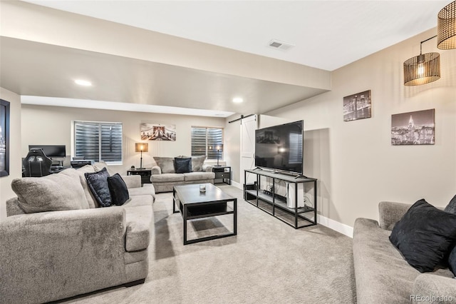 10553 Stonemeadow Dr, Parker, CO 80134 - living area featuring a barn door, carpet, and recessed lighting