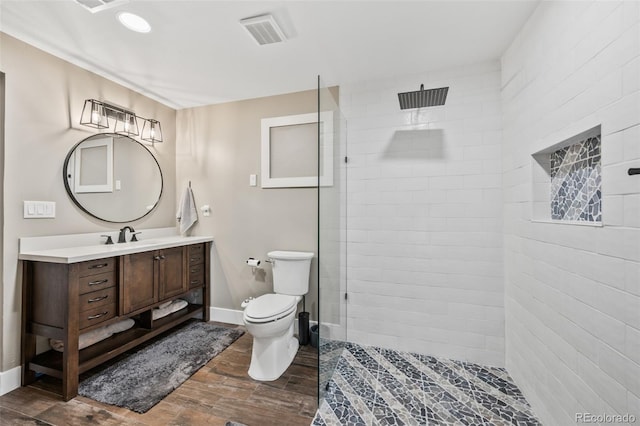 10553 Stonemeadow Dr, Parker, CO 80134 - bathroom with a walk in shower, vanity, and wood finished floors