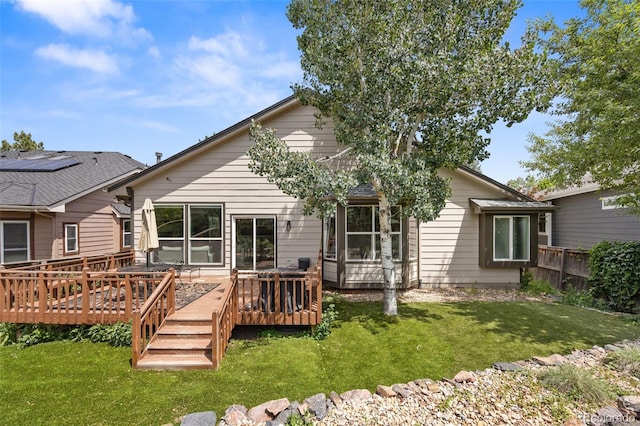 10553 Stonemeadow Dr, Parker, CO 80134 - rear view of property with a wooden deck