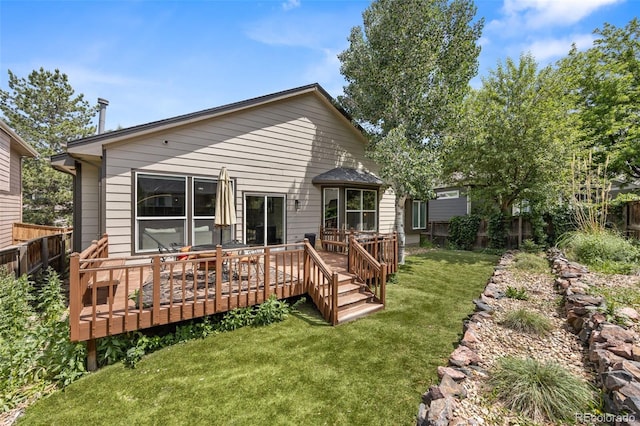 10553 Stonemeadow Dr, Parker, CO 80134 - rear view of house featuring a fenced backyard and a deck