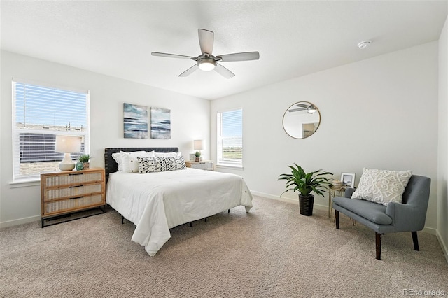 226 Racer St, Bennett, CO 80102 - carpeted bedroom featuring baseboards and ceiling fan