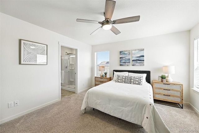 226 Racer St, Bennett, CO 80102 - carpeted bedroom featuring ensuite bathroom and ceiling fan