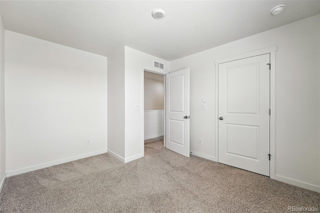 226 Racer St, Bennett, CO 80102 - unfurnished bedroom featuring light colored carpet and baseboards