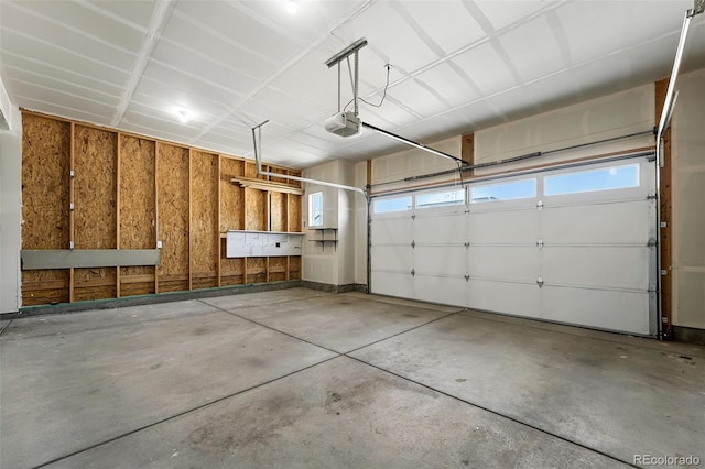226 Racer St, Bennett, CO 80102 - garage with a garage door opener
