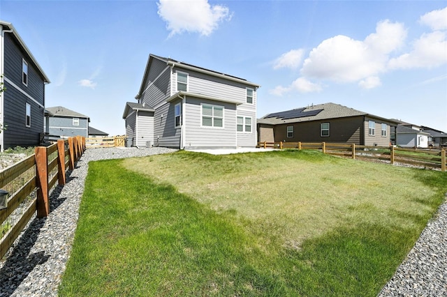 226 Racer St, Bennett, CO 80102 - back of house with a fenced backyard and a patio area