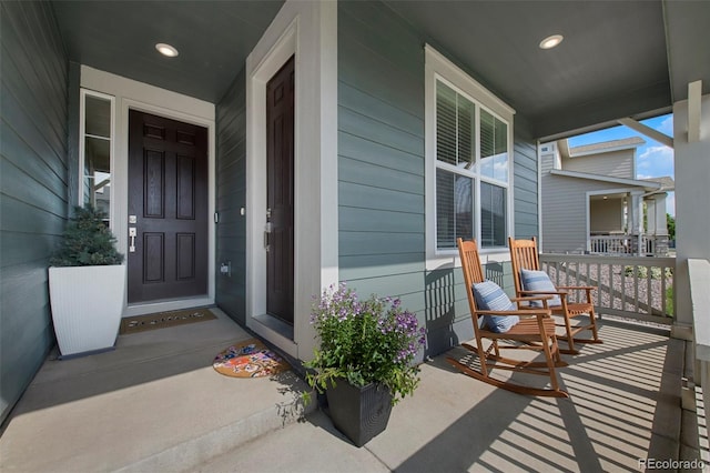 12826 Lake Port St, Longmont, CO 80504 - property entrance featuring a porch