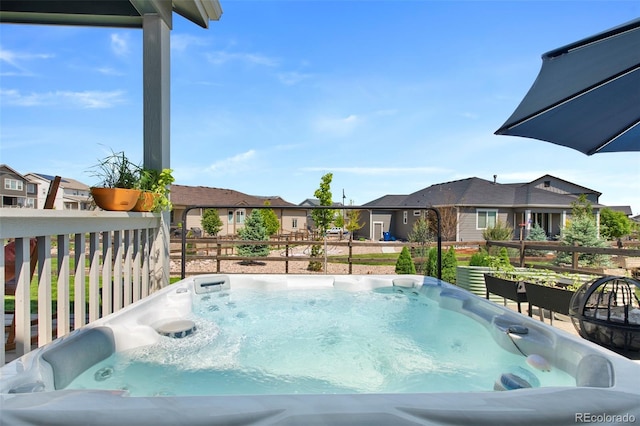12826 Lake Port St, Longmont, CO 80504 - view of swimming pool with a hot tub and a residential view