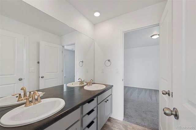 12826 Lake Port St, Longmont, CO 80504 - full bath with double vanity and tile patterned flooring