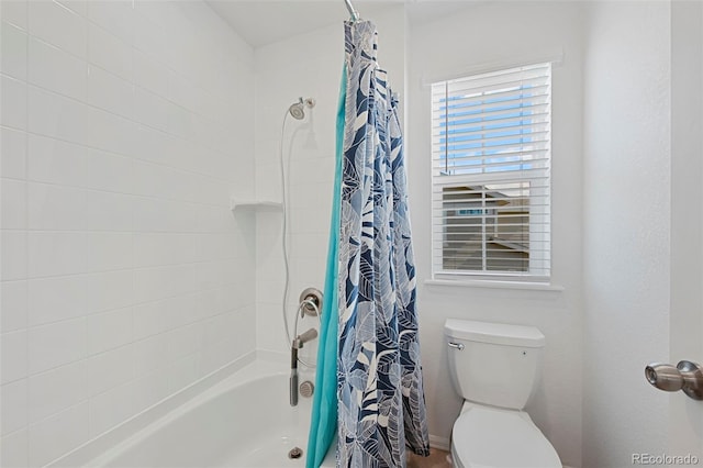 12826 Lake Port St, Longmont, CO 80504 - full bathroom featuring shower / bath combo with shower curtain and toilet