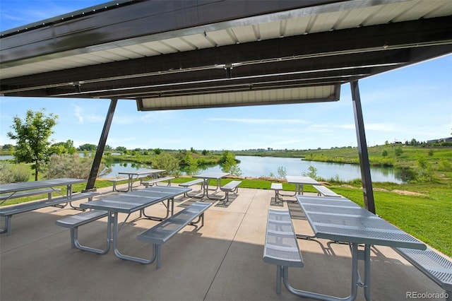 12826 Lake Port St, Longmont, CO 80504 - view of community featuring a water view and a patio area